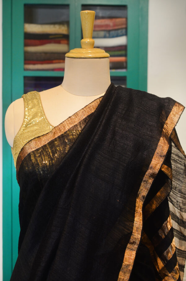 Black Matka silk saree with golden zari border - Image 2