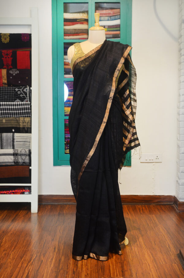 Black Matka silk saree with golden zari border