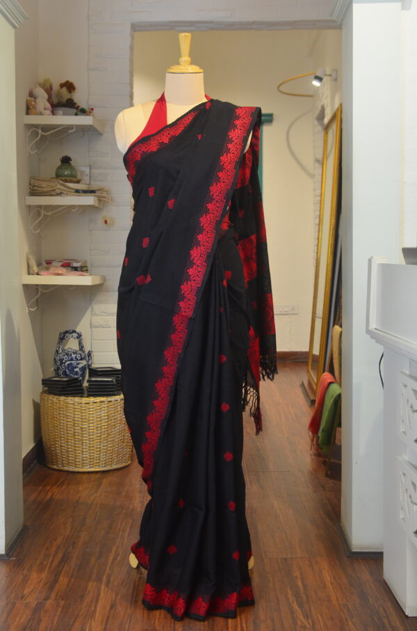 Black and Red cotton saree with red Naksha paar work and motifs all over